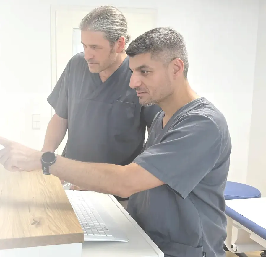 Arne Schlichting und Dr. Bülent Kilic